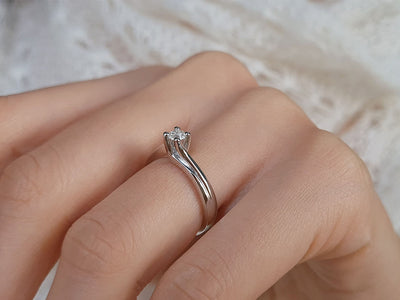 0.18 carat diamond solitaire ring