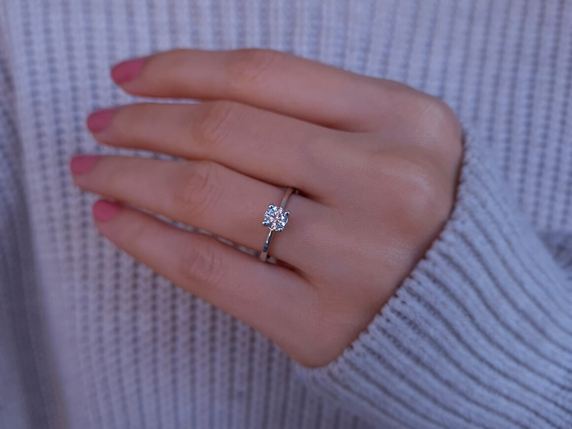 0.53 carat diamond solitaire ring in 18 K