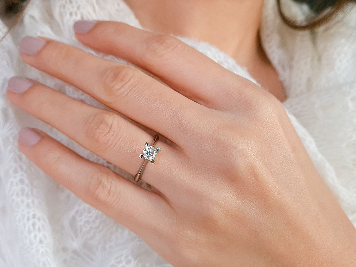 0.50 carat diamond solitaire ring in 18 K