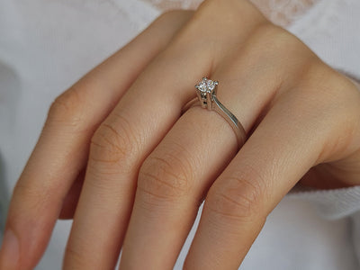 0.28 carat diamond solitaire ring in 18 K