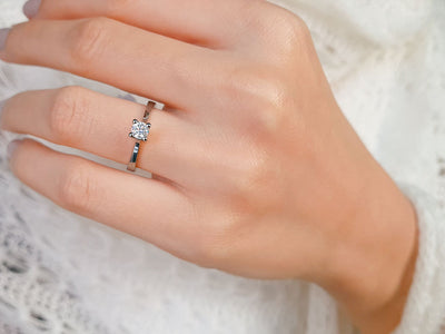 0.31 carat diamond solitaire ring in 18 K