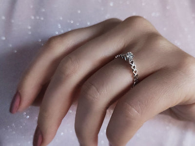 G color 0.15 carat diamond solitaire ring