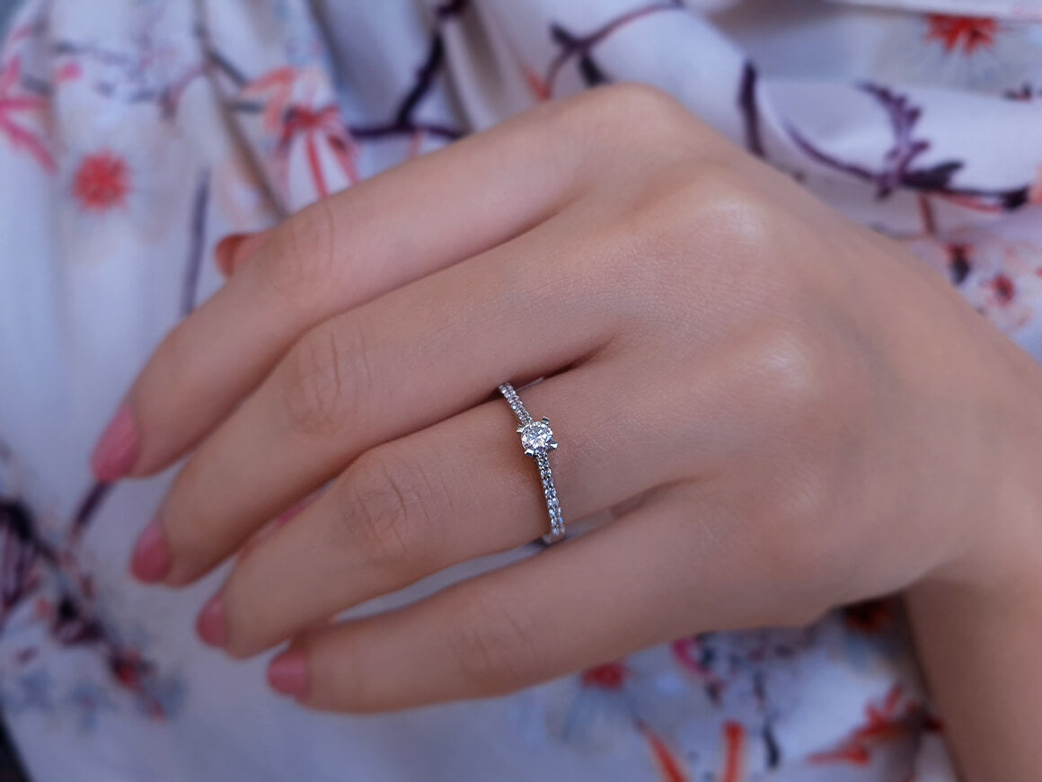 0.32 total carat diamond solitaire ring in 18 K