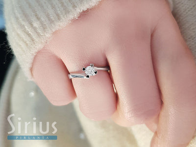 0.23 carat diamond solitaire ring