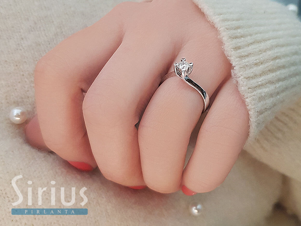 0.23 carat diamond solitaire ring