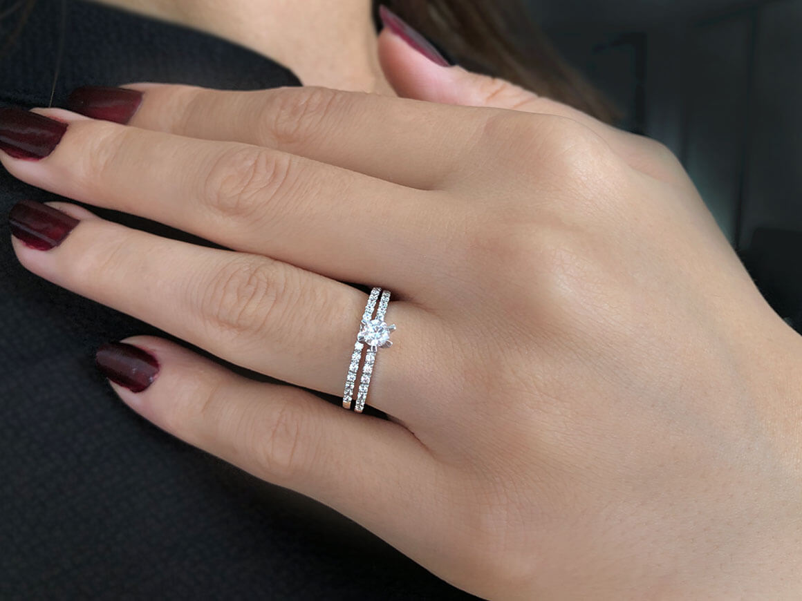 0,55 Carat Diamant Solitär Ring und Allianz