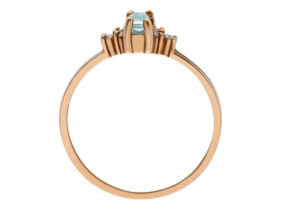 Diamond and baguette cut aquamarine ring in 14 carat red gold