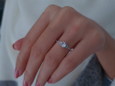 Diamond ring with white topaz in white gold