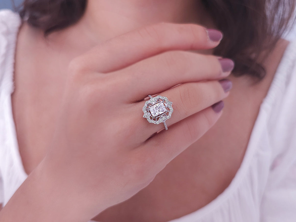 Diamond ring with octagonal cut white topaz in white gold