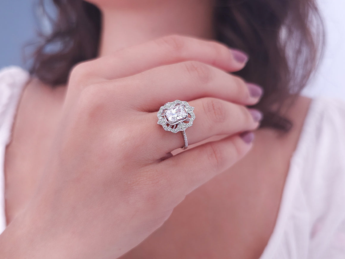 Diamond ring with octagonal cut white topaz in white gold