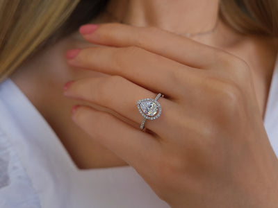 Diamond and white topaz waterdrop ring