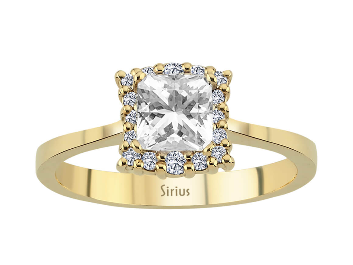 Yellow gold ring with diamond and white topaz