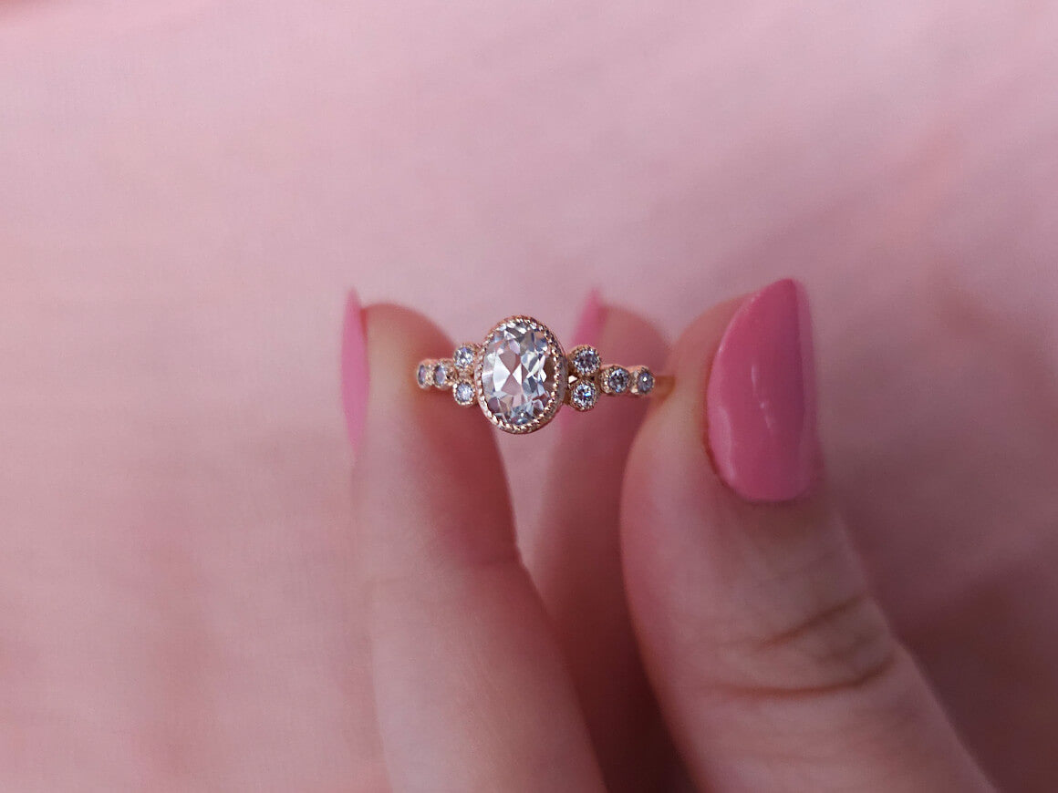 Dora ring with diamonds and oval white topaz