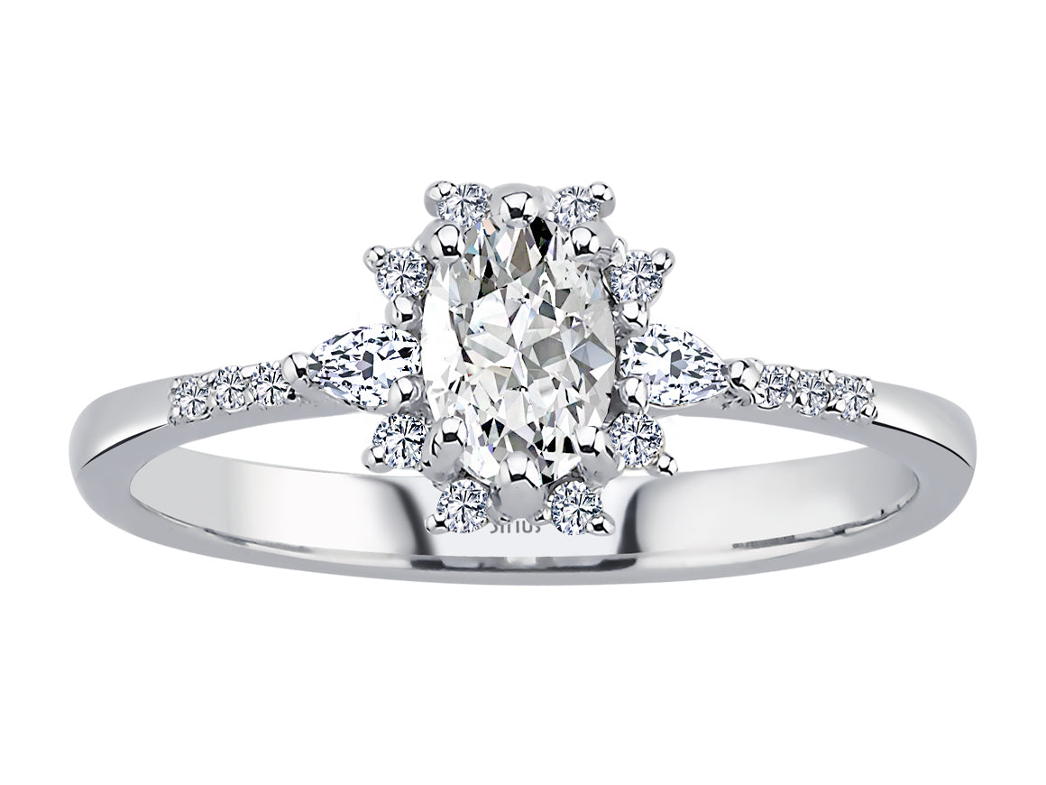 Ring mit Diamanten und weißen Topasen - handgefertigter Diamantschmuck aus Feingold | Sirius Diamant