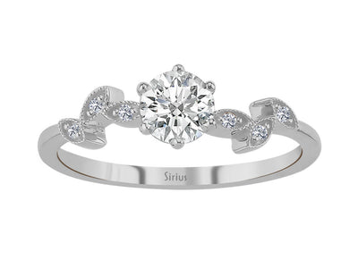 Diamond ring with white sapphire