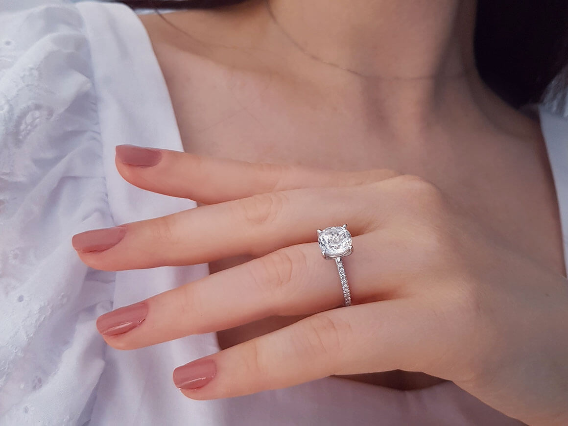 Diamond and white topaz ring in 14K white gold