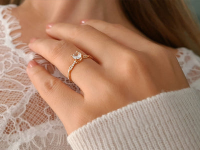 twisted diamond and white topaz solitaire ring in 14K red gold