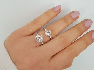 Total 1.20 carat diamond and white topaz solitaire ring