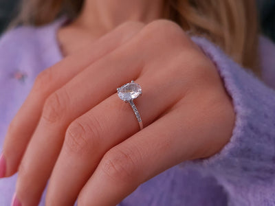 Diamond and white topaz ring in 14 K white gold