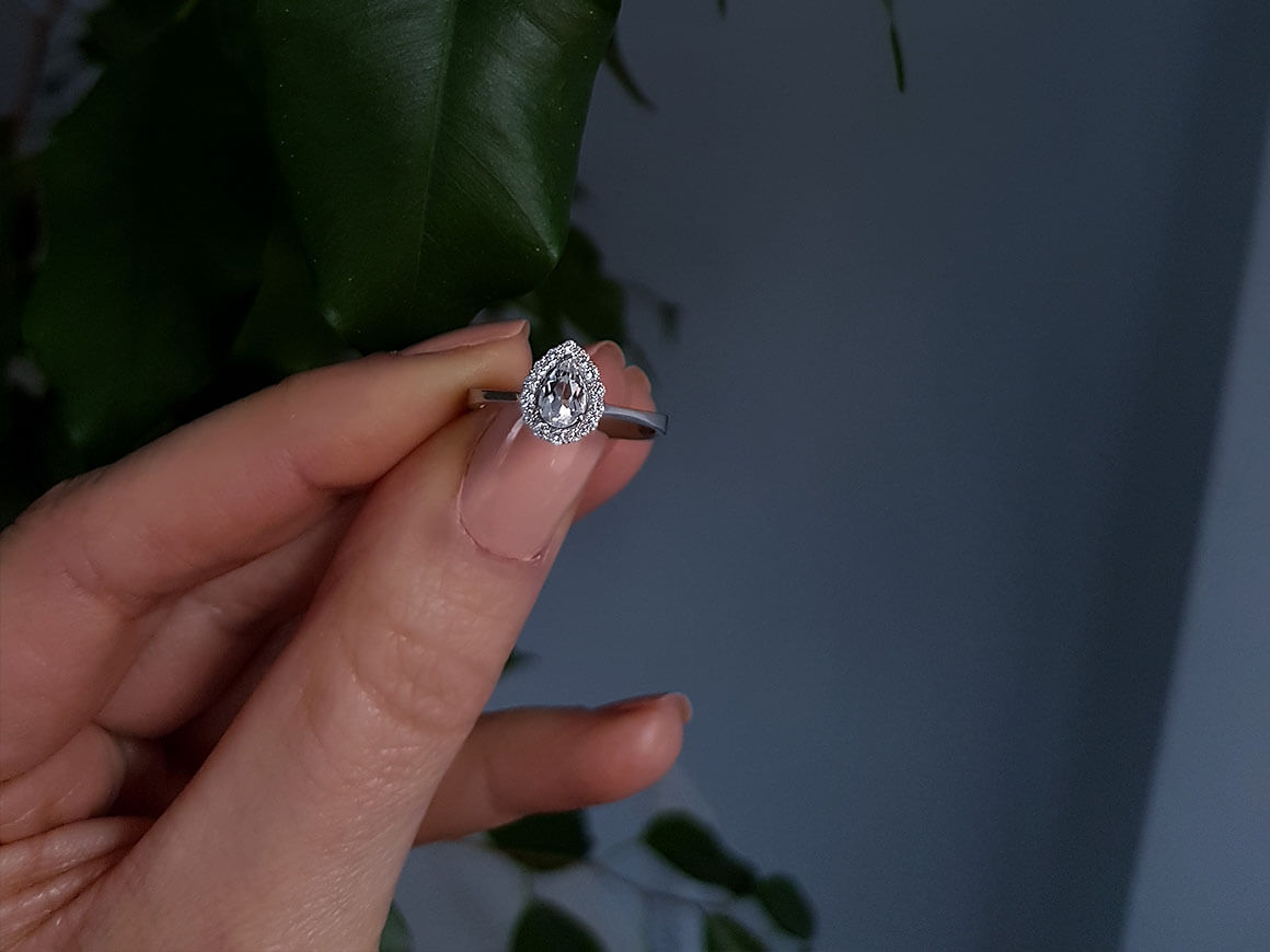 Diamond and Pear Cut White Topaz Solitaire Ring