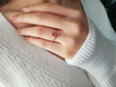 Diamond and drop cut pink tourmaline ring in 333 8 carat red gold