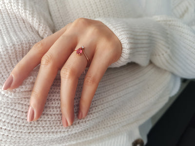Diamond and drop cut pink tourmaline ring in 333 8 carat red gold