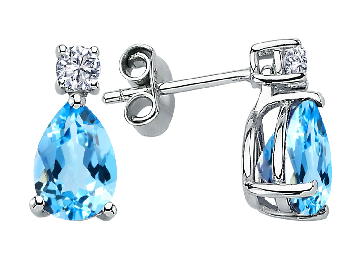 Earrings with diamonds and drop-shaped blue topazes