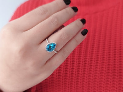 Diamond and Drop Blue Topaz Ring