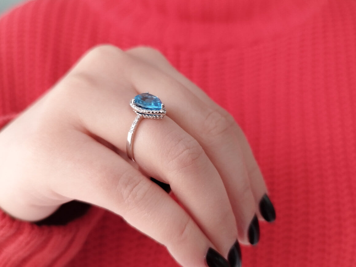 Diamond and Drop Blue Topaz Ring