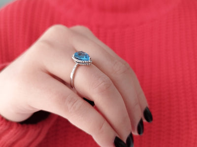 Diamond and Drop Blue Topaz Ring