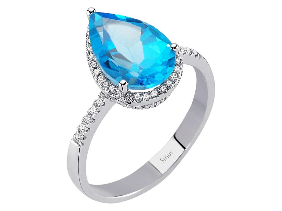 Diamant und Drop Blauer Topas Ring - handgefertigter Diamantschmuck aus Feingold | Sirius Diamant