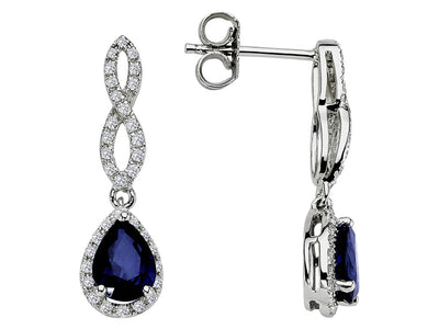 Diamond and teardrop sapphire earrings in 585 14 carat white gold