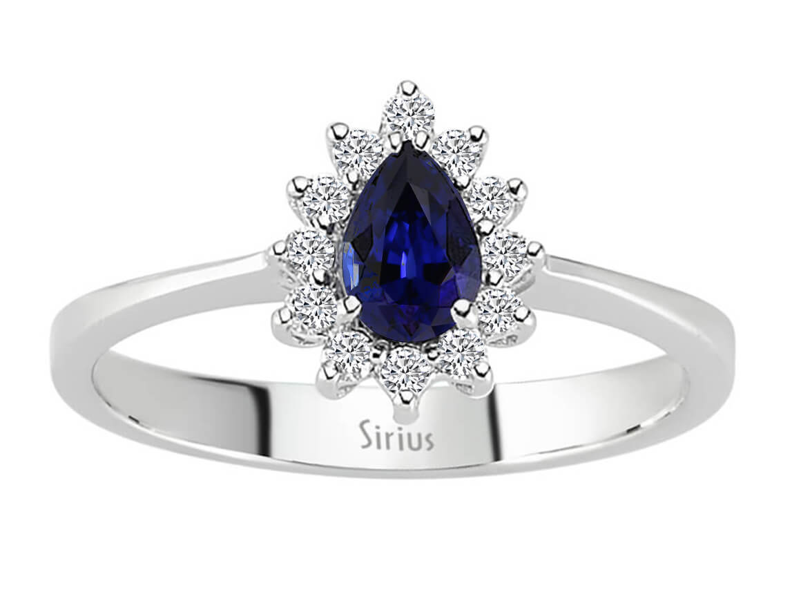Diamond and pear sapphire ring in 14 K white gold
