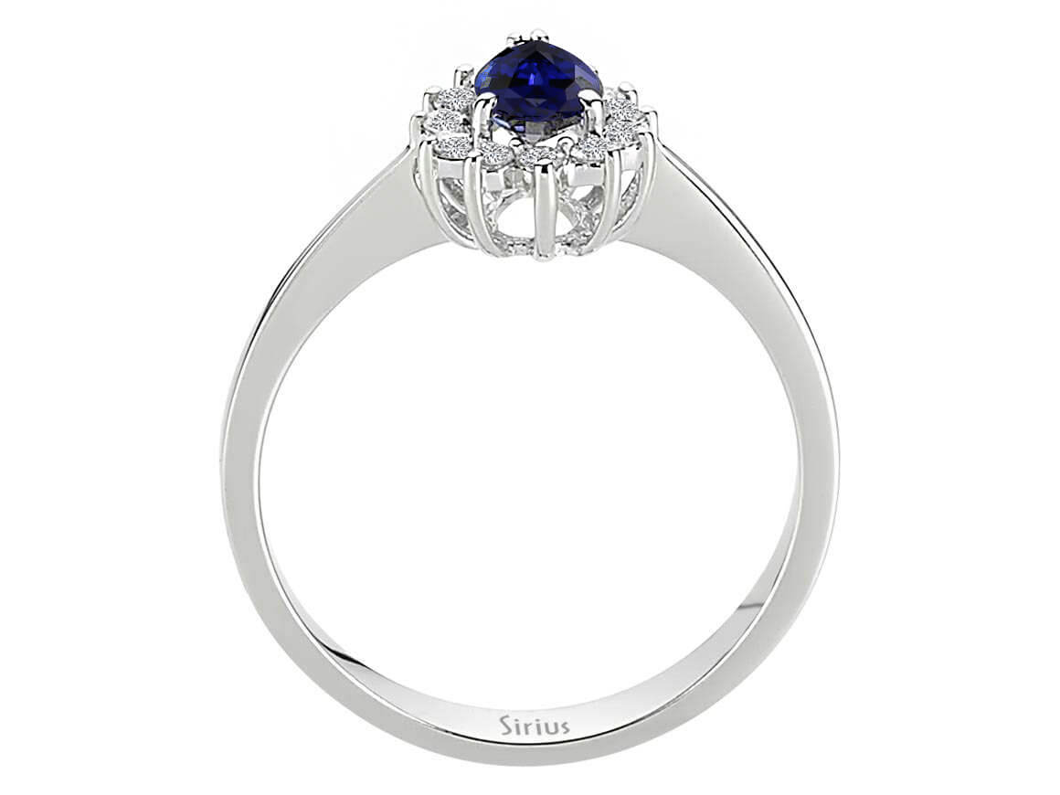 Diamond and pear sapphire ring in 14 K white gold