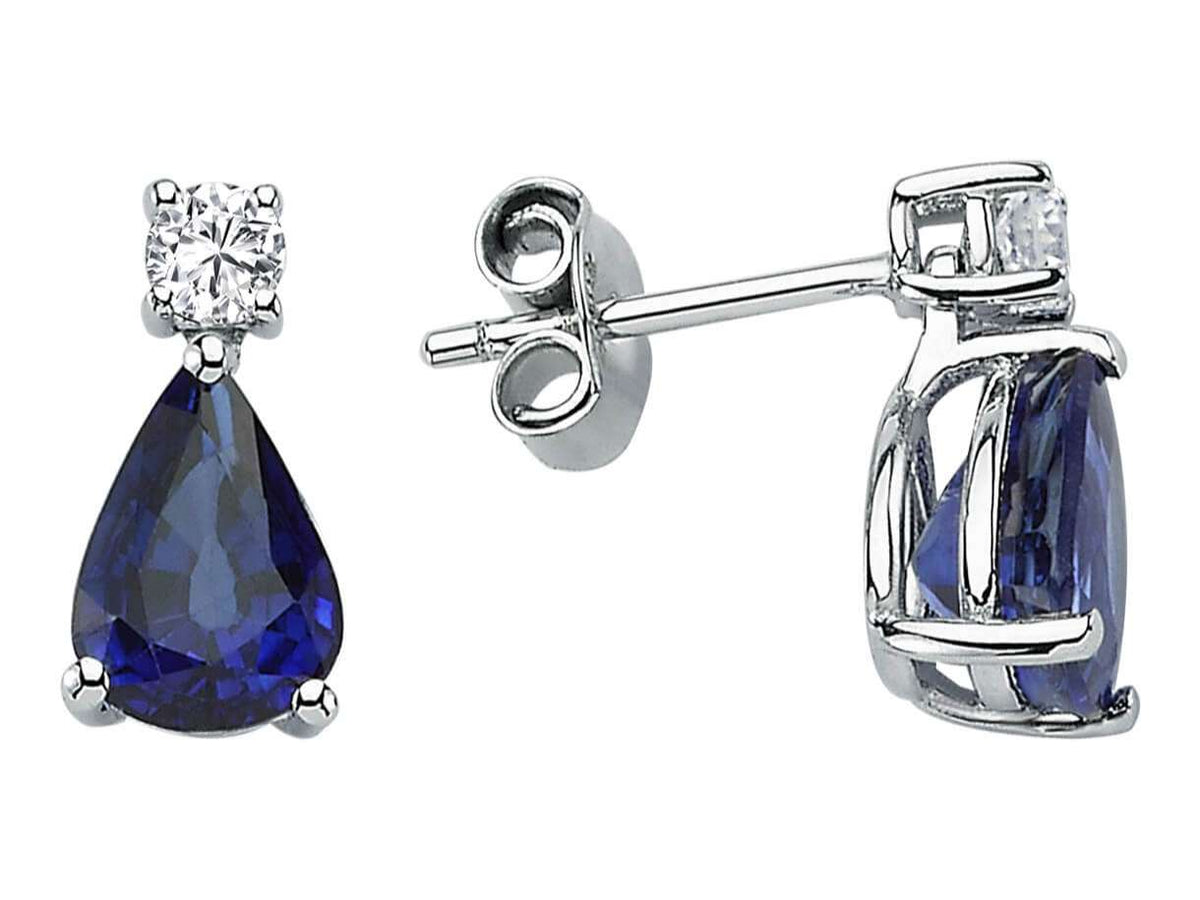 Diamant und Tropfen Saphir Ohrstecker - handgefertigter Diamantschmuck aus Feingold | Sirius Diamant