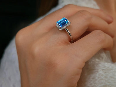 Diamond and Emerald Cut Blue Topaz Ring