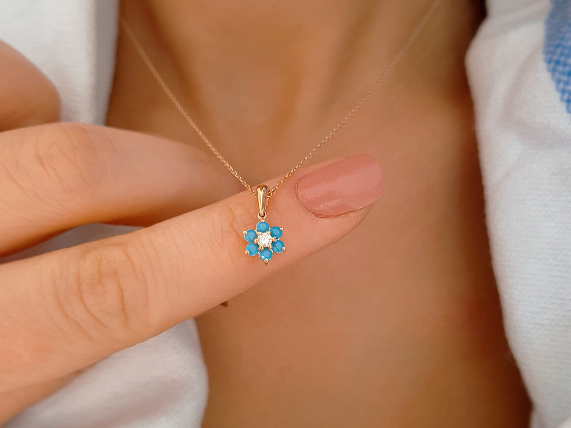 Diamond and turquoise daisy necklace in 333 8 K red gold