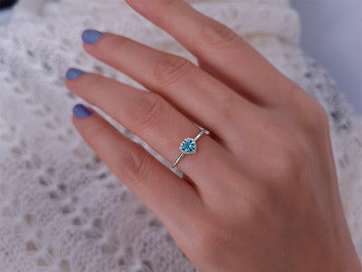 Amare diamond and heart ring with blue topaz