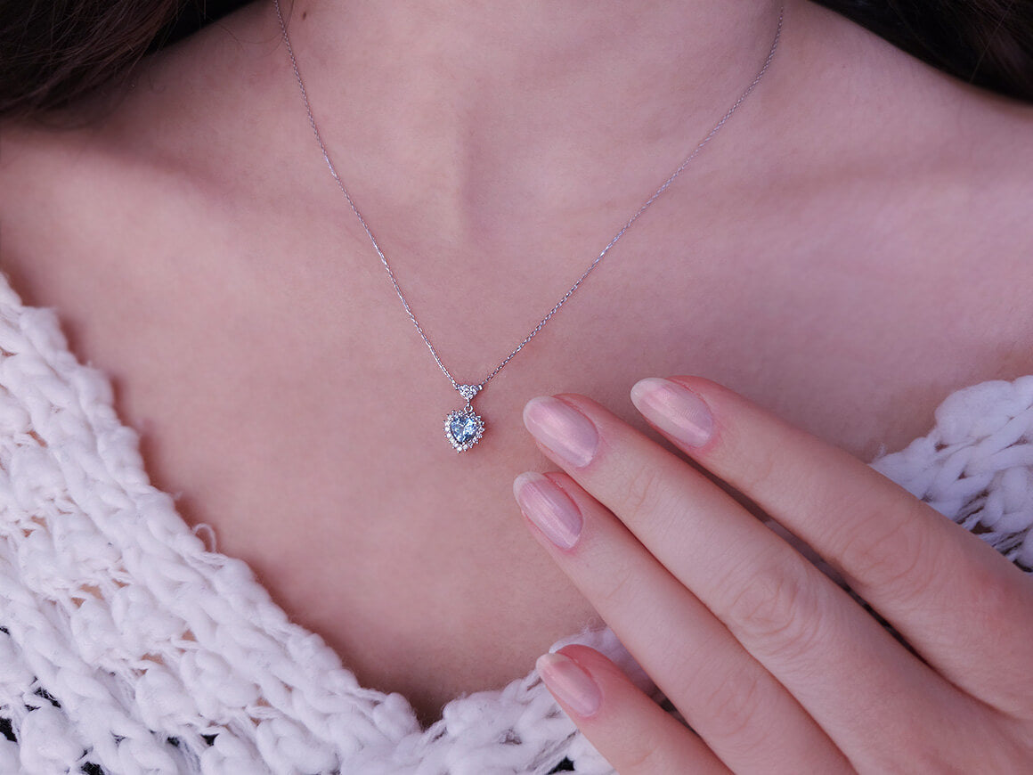 Diamond and heart cut blue topaz jewelry set in 14 K white gold