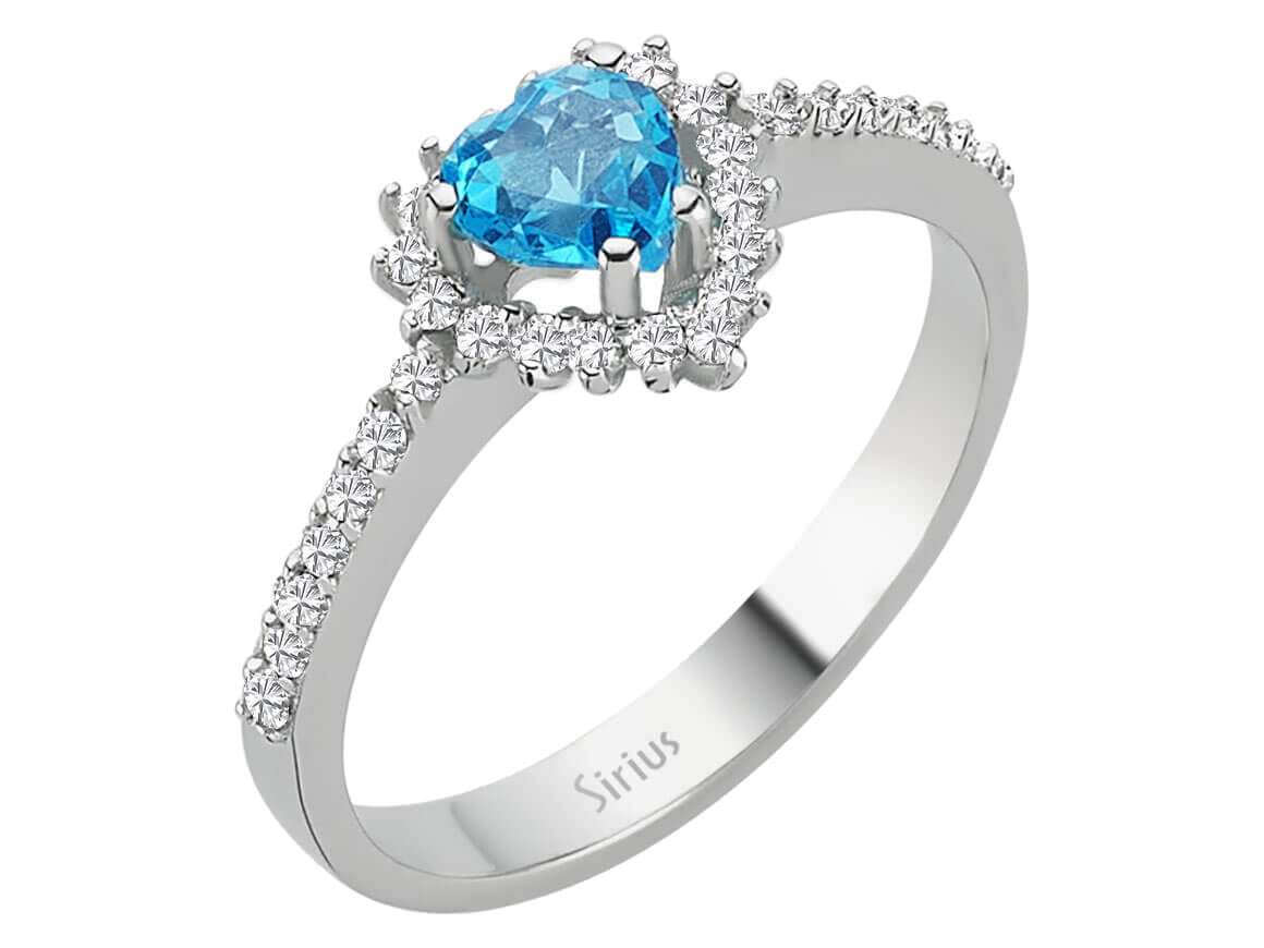 Diamond and heart cut blue topaz jewelry set in 14 K white gold