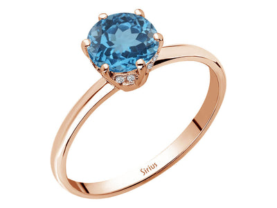 Rosetta ring with diamonds and London blue topaz