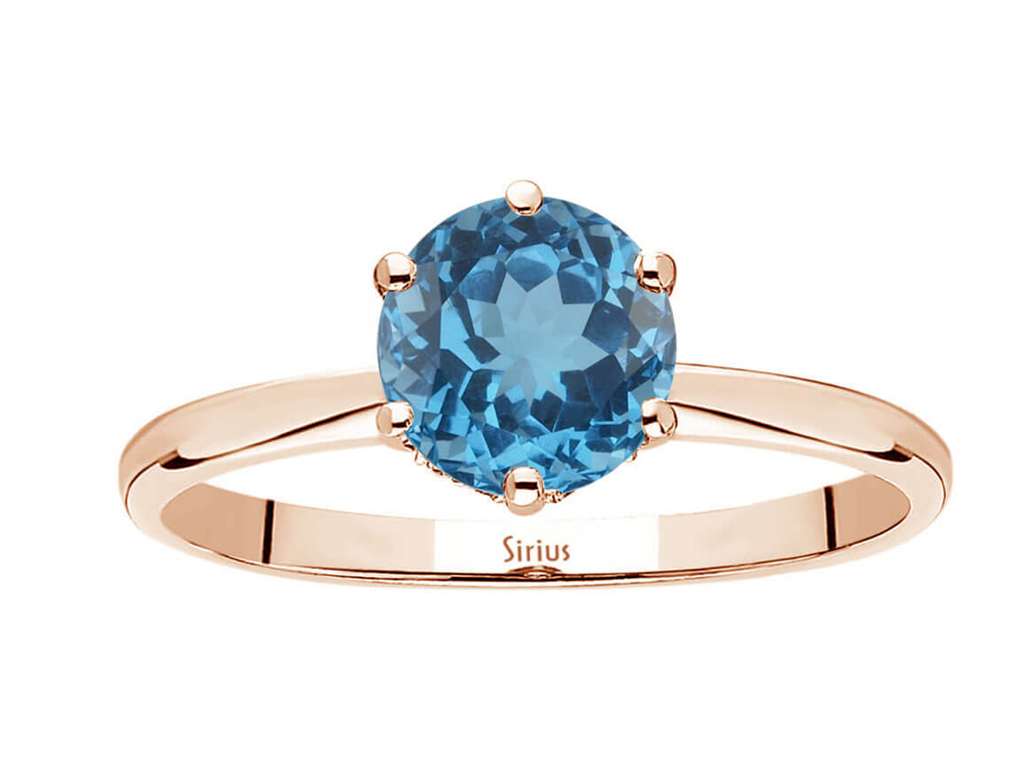 Rosetta ring with diamonds and London blue topaz
