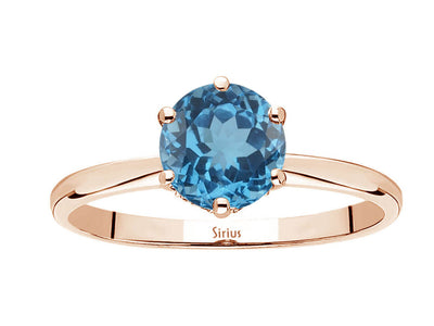 Rosetta ring with diamonds and London blue topaz