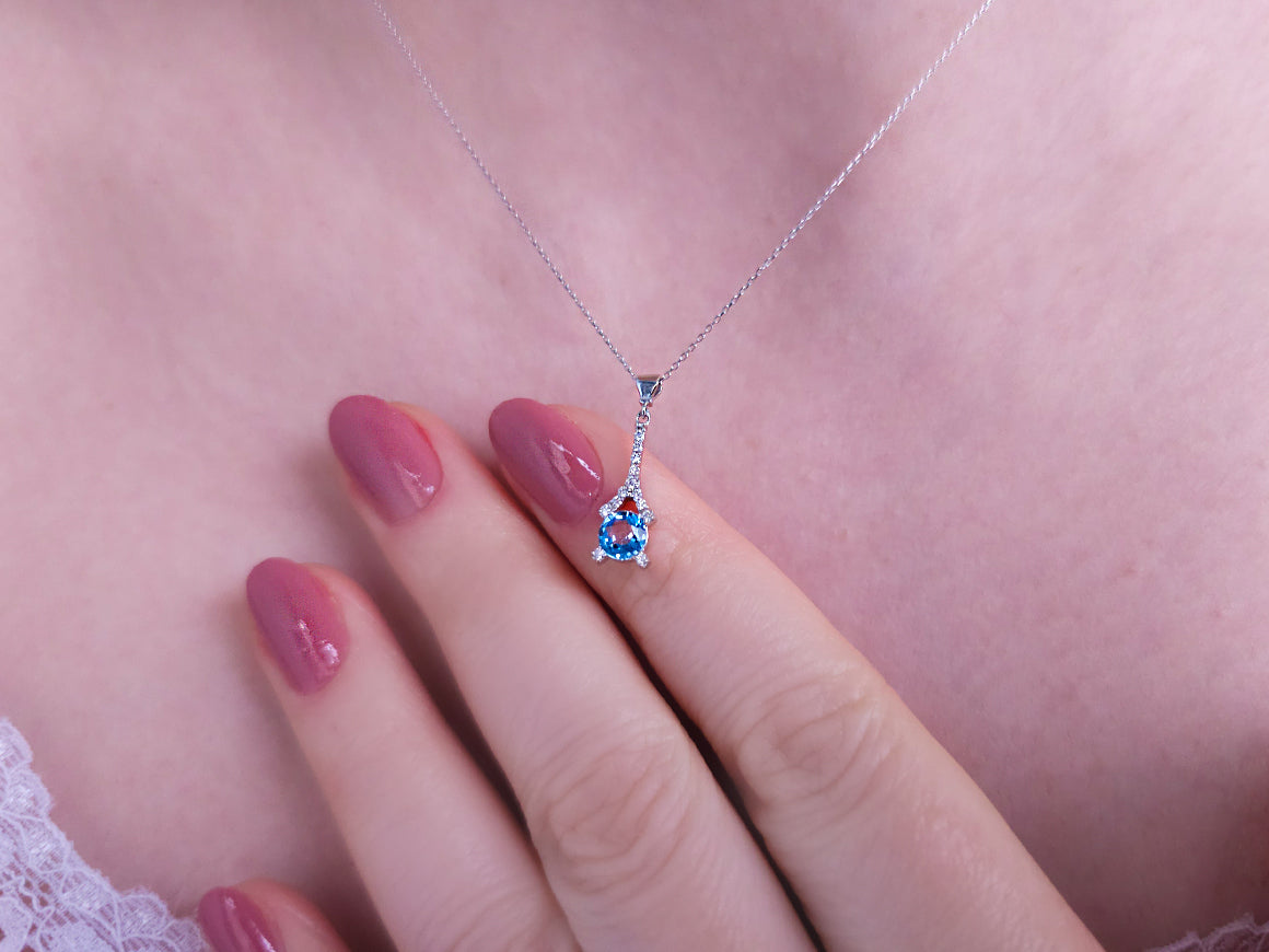 Collier Eiffel avec diamants et topaze bleue en or 14 carats