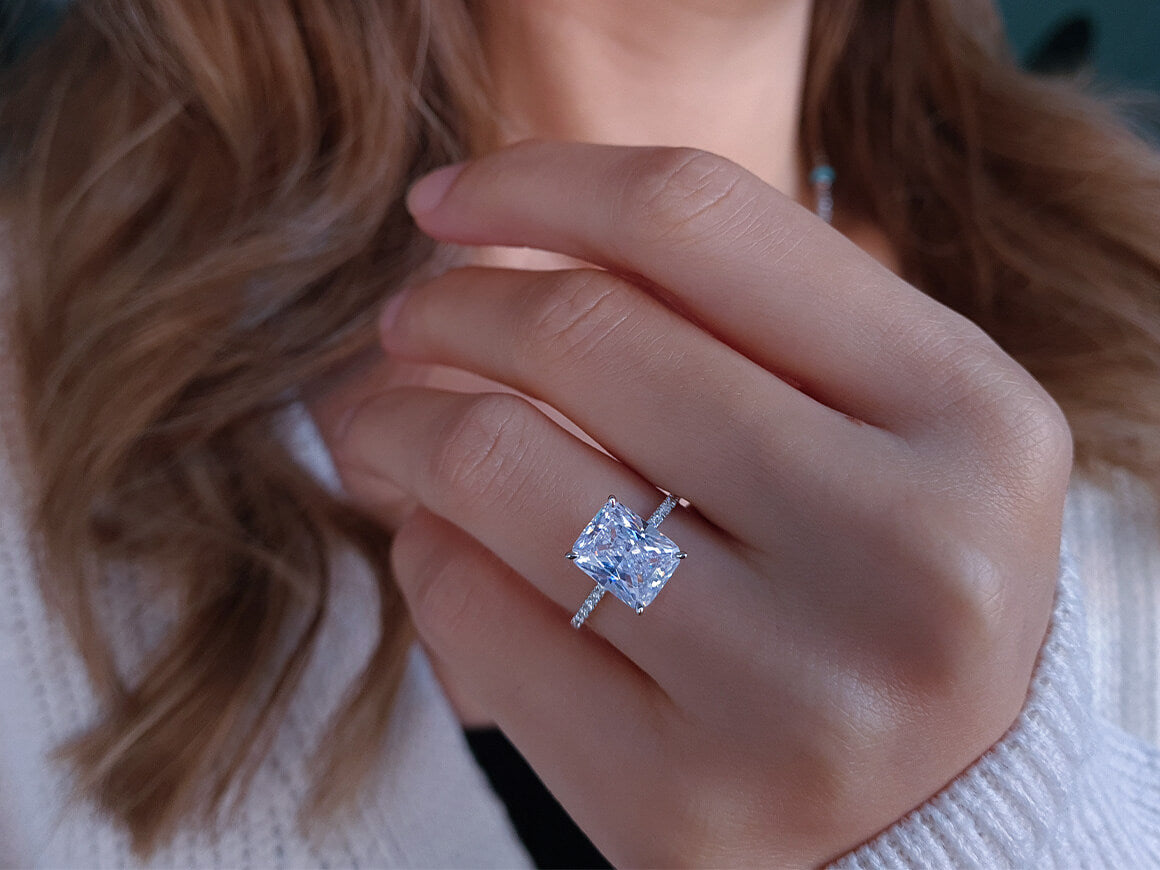 Diamond ring with octagonal cut white topaz in white gold