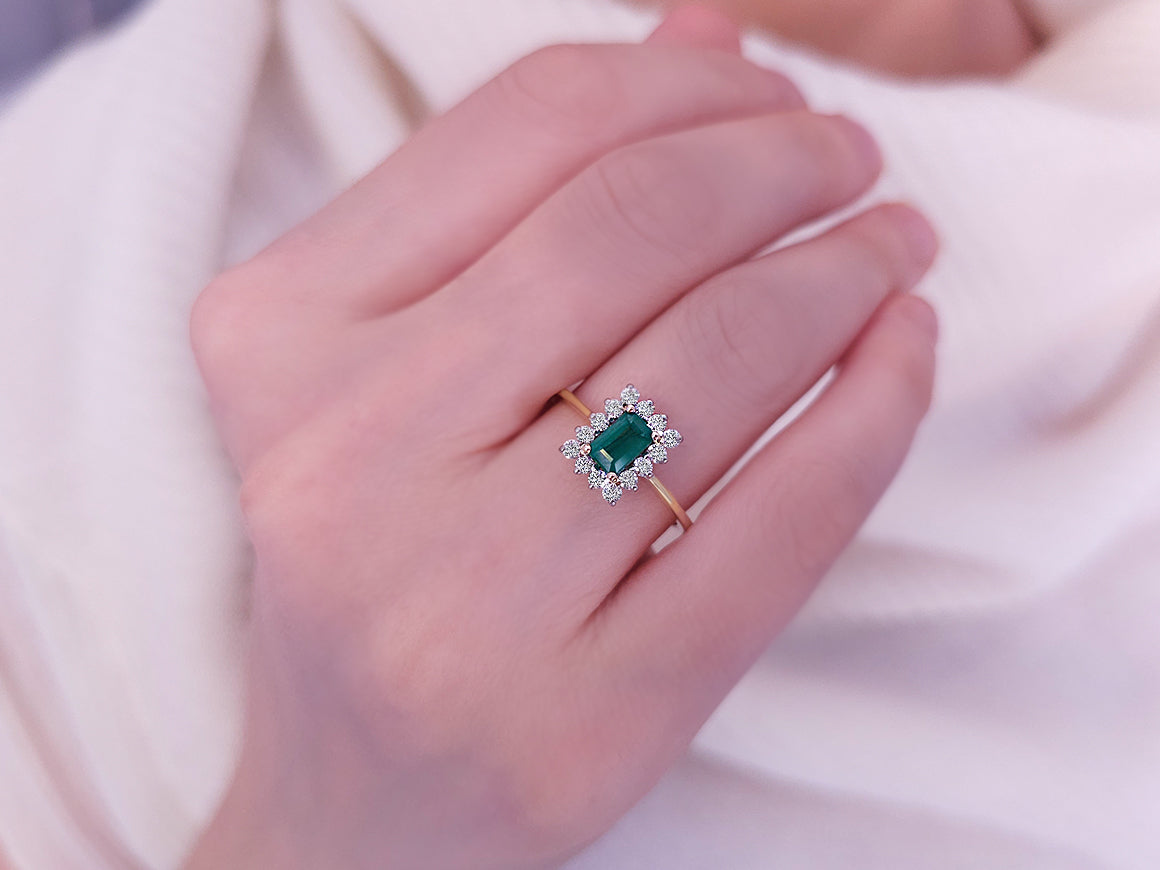 Diamond and octagon emerald ring in 14 carat white and yellow gold