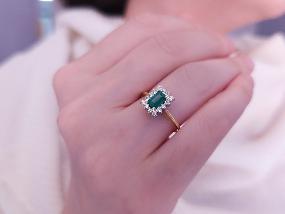 Diamond and octagon emerald ring in 14 carat white and yellow gold