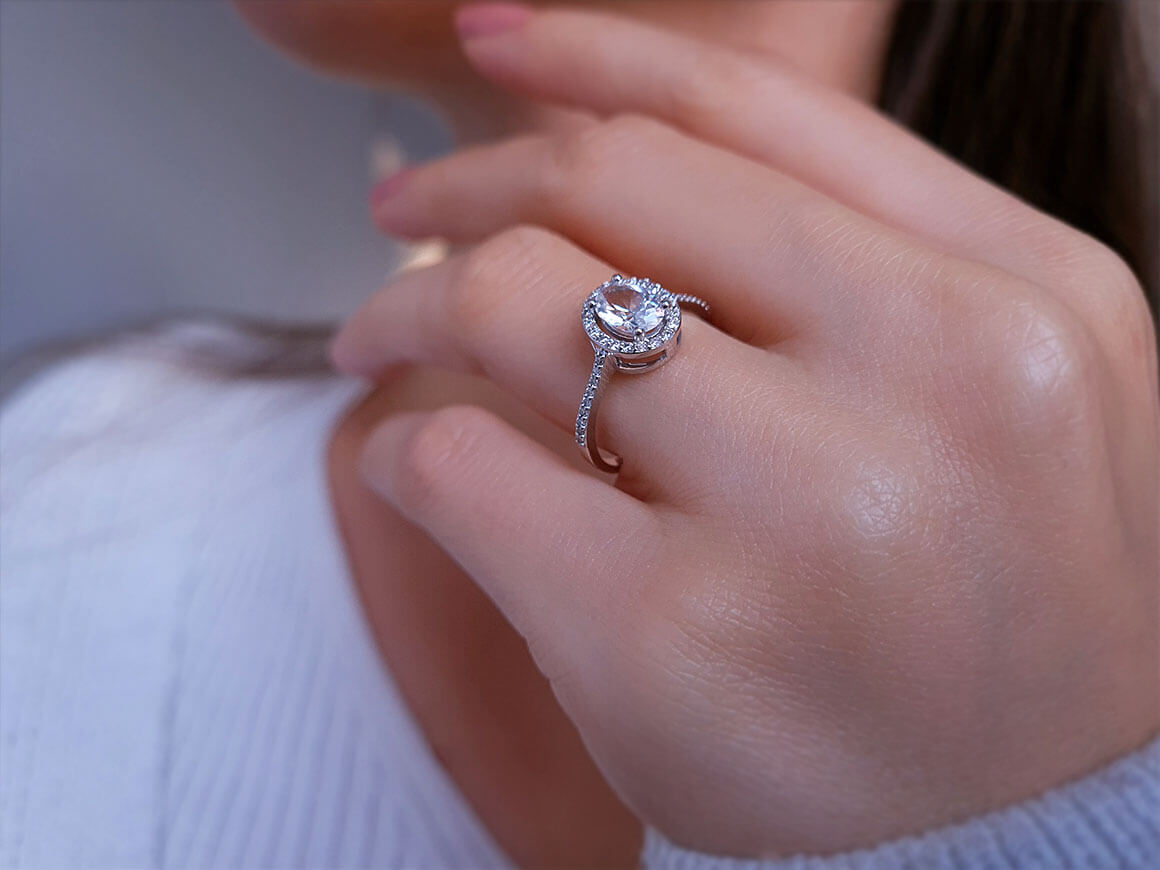 Diamond and Oval White Sapphire Ring