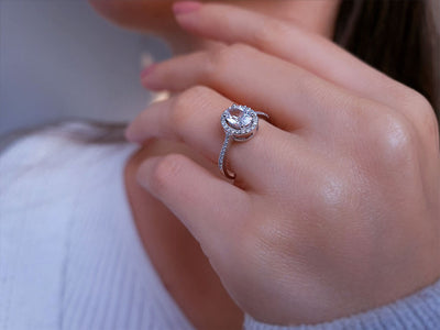 Diamond and Oval White Sapphire Ring