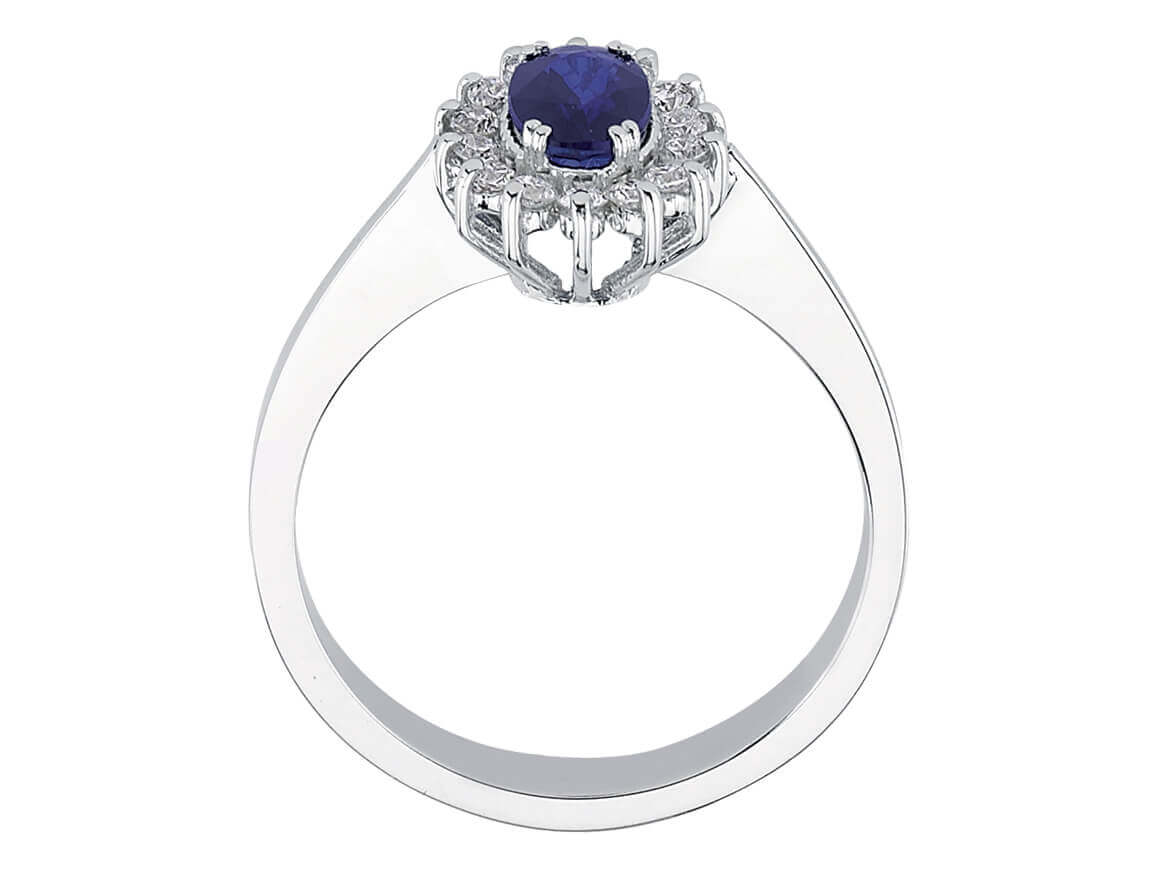 Diamond and oval sapphire jewelry set in 14 K white gold